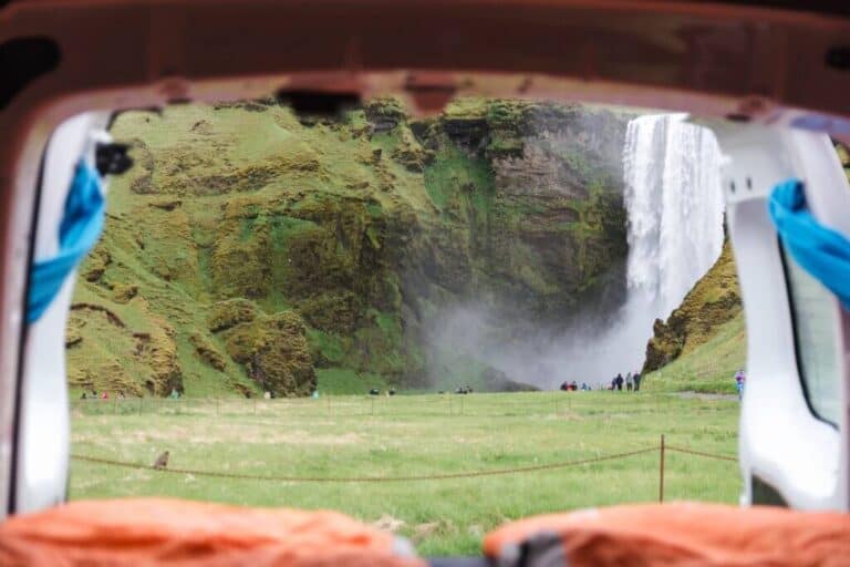 inside Renault kangoo camper with waterfall view