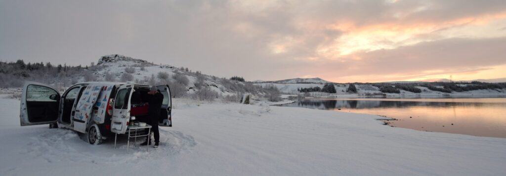 Camper van camped in the snow