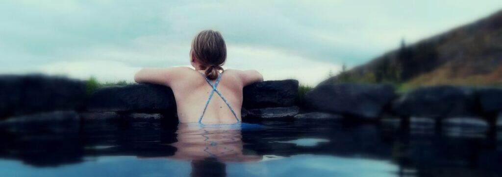 woman in a nature hot tub