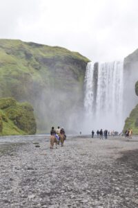 Skógafoss with horses