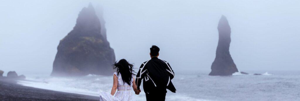 Reynisdrangar rock pillars black sand beach