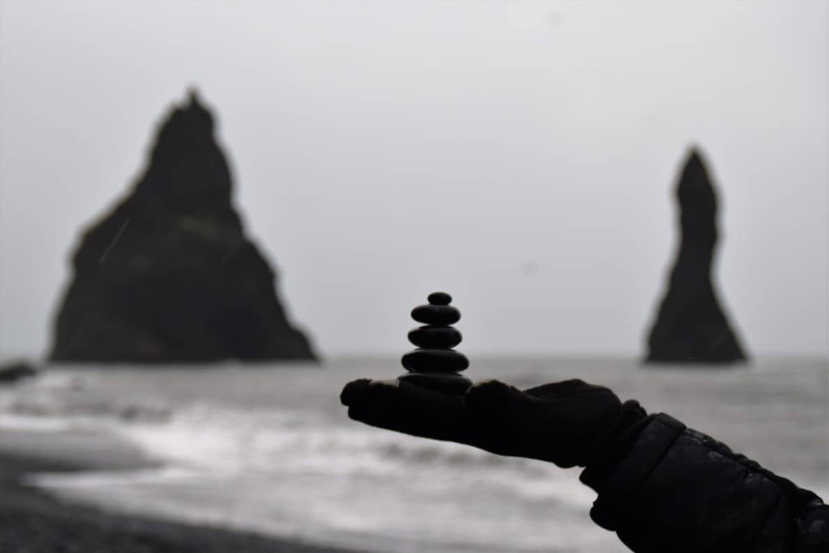 Playing with stones at Reynisfjara
