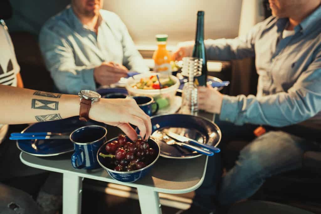 VW California 4×4 camper interior dinner time