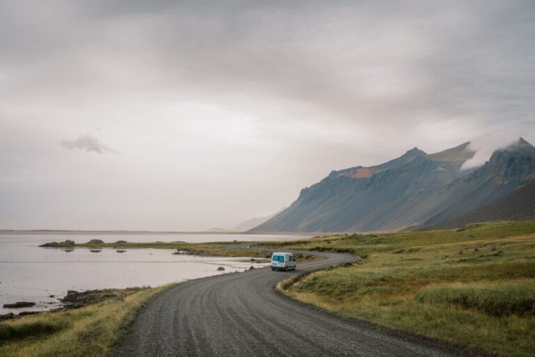 rent renault master 5 campervan driving on road in Iceland mountains nature