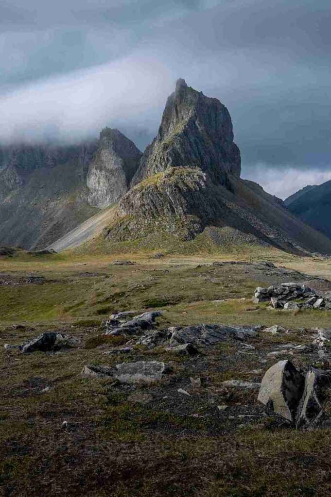 A mountain in a far. Dark clouds above