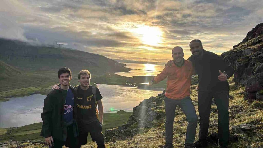 A sunset view of the ocean and mountains