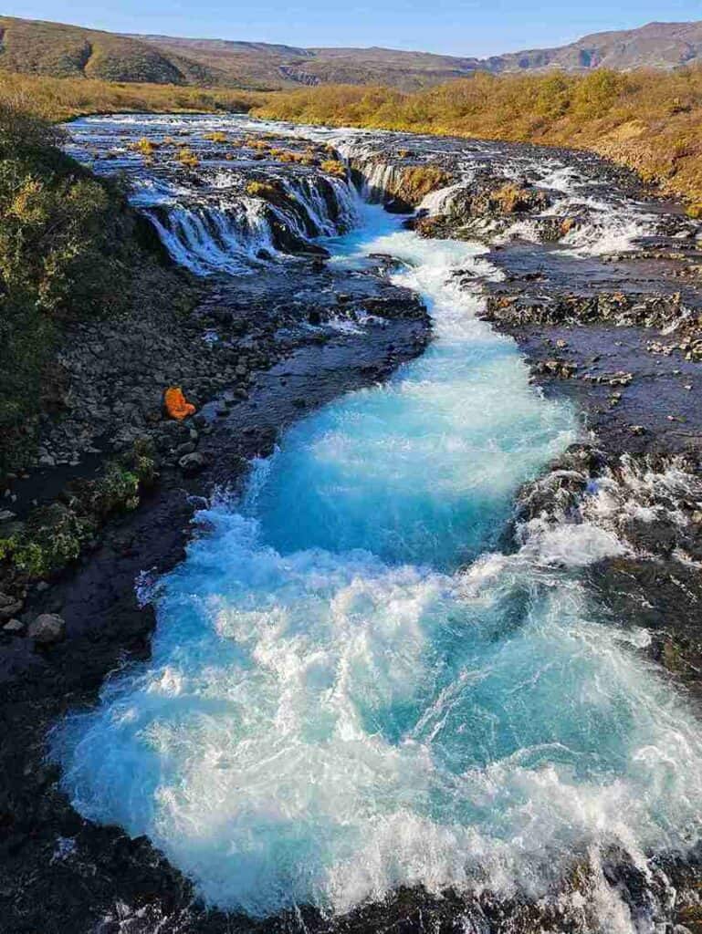 A very blue waterfall.
