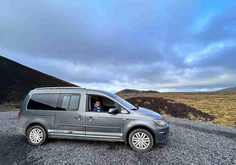 Caddy with a woman inside