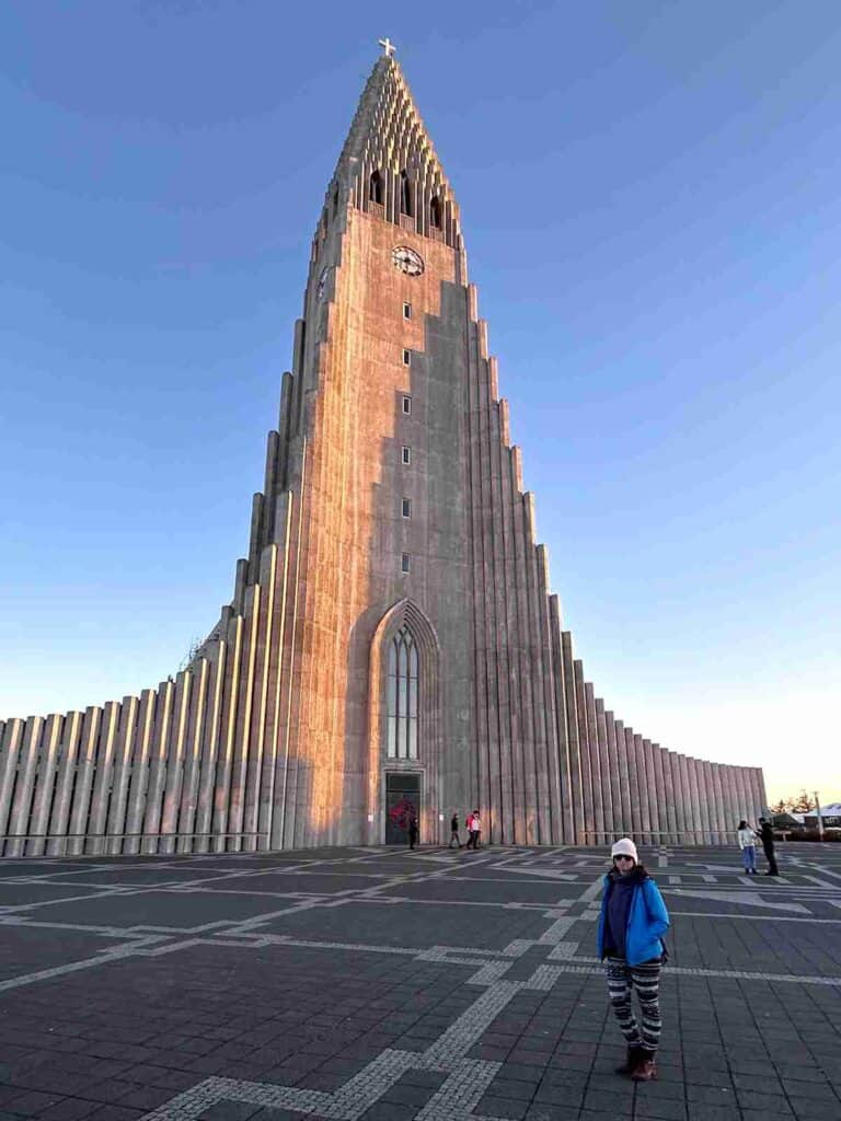 A woman Standing by Hallgrímskirkja